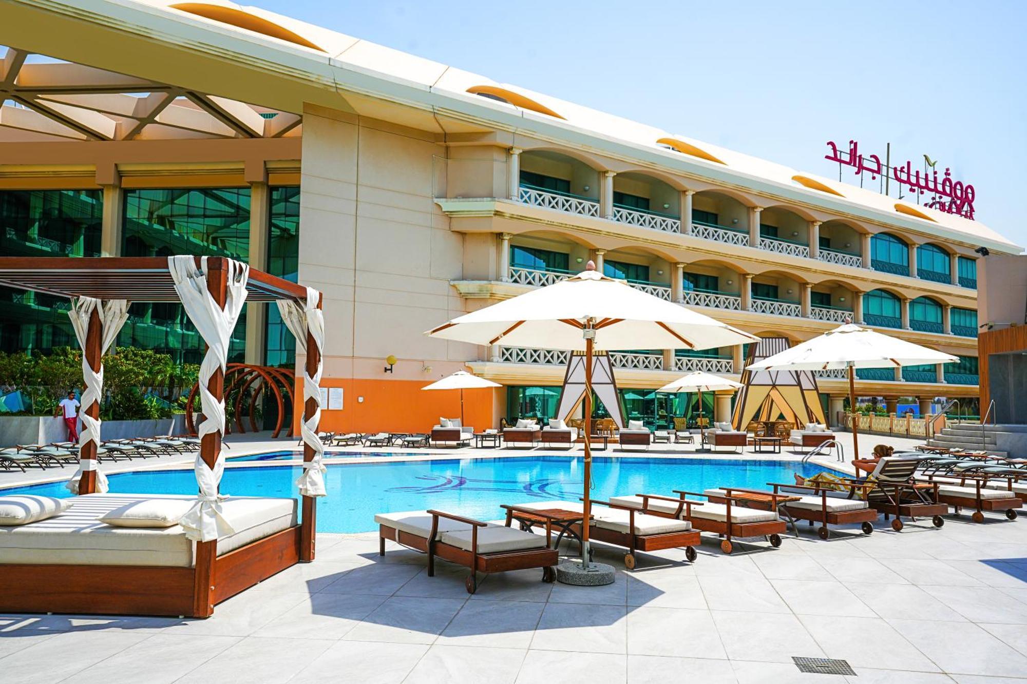 Moevenpick Grand Al Bustan Hotel Dubai Exterior photo The pool at the hotel