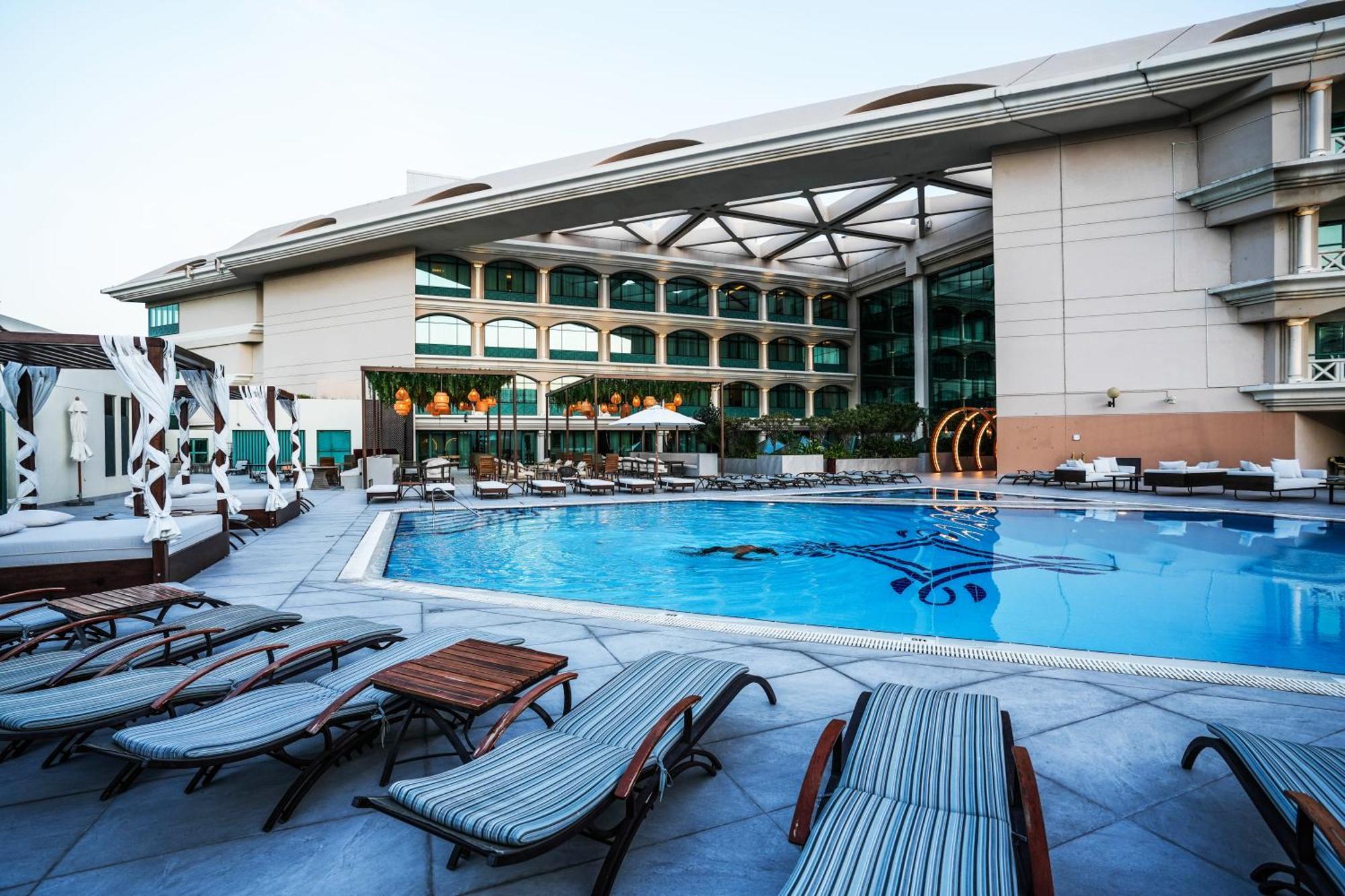 Moevenpick Grand Al Bustan Hotel Dubai Exterior photo The pool at the hotel